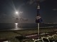 In foto la Luna che brilla nel cielo di Pietra Ligure